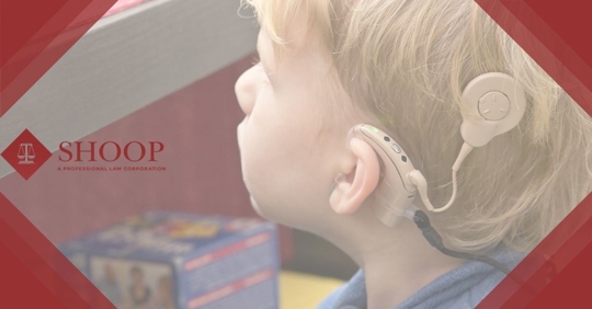 Little boy with cochlear implant